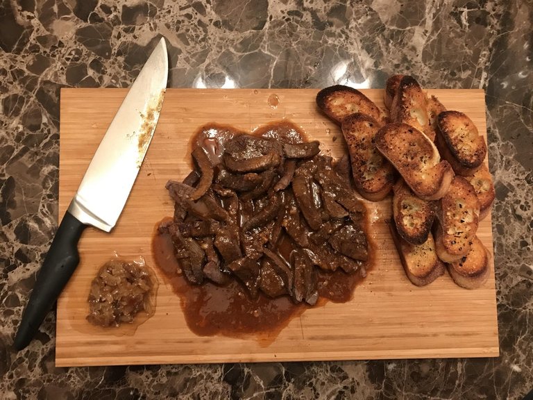 Yummy  Beer braised beef with garlic toastini and caramelized onions..jpg