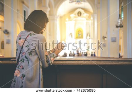 stock-photo-christian-woman-is-holding-hands-together-and-praying-in-the-church-worship-god-with-christian-742675090.jpg