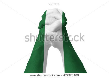 stock-photo-man-clasped-hands-patterned-with-the-nigeria-flag-477378469.jpg