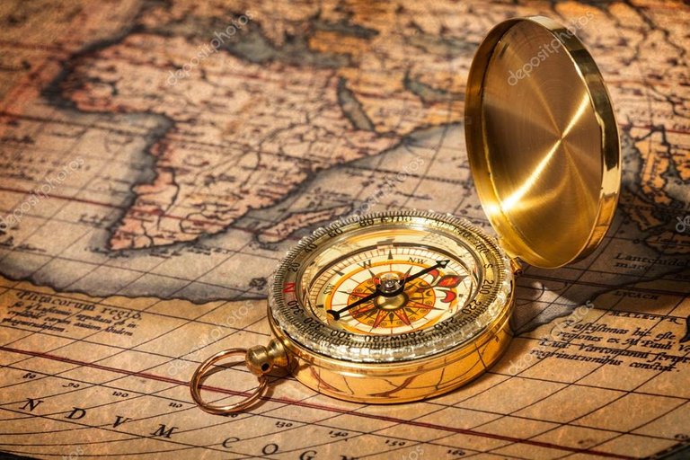 depositphotos_13336219-stock-photo-old-vintage-golden-compass-on.jpg