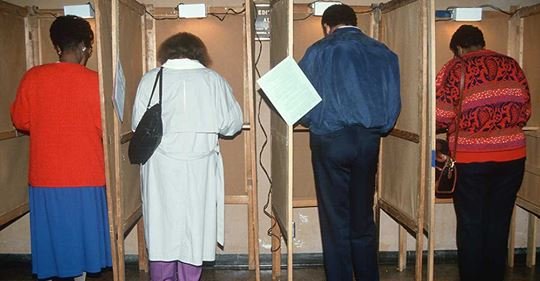 Voters in Booths.jpg