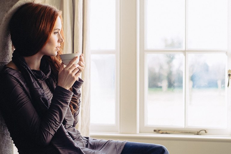 woman-looking-out-the-window-young.jpg