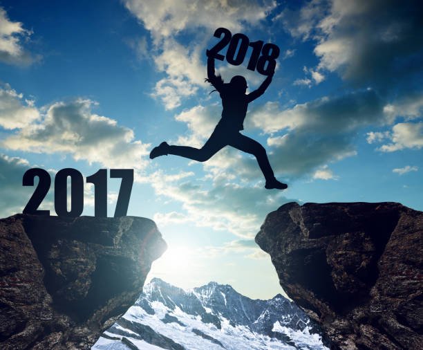 girls-jump-to-the-new-year-2018-picture-id644943228.jpeg