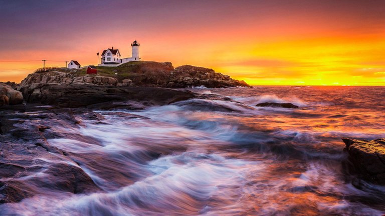 lighthouse-on-rocks-1920x1080-wallpaper-16905.jpg