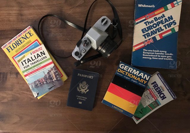 stock-photo-travel-camera-passport-travel-essentials-travel-items-foreign-languages-studying-languages-language-books-5177a9bc-b712-4153-8e22-71854ef8a5c6.jpg