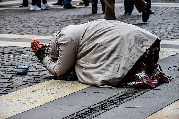 closeup-of-beggar-pleading-on-street-picture-id688926813.jpg