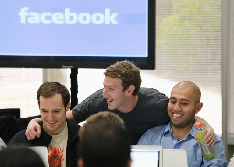 mark zuckerberg with young employees.jpg