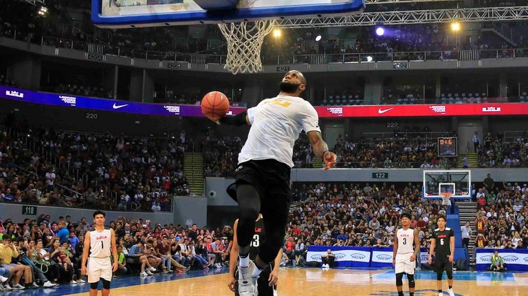 National-Basketball-Association-star-player-Lebron-James-of-Cleveland-Cavaliers-dunks-during-an-exhibition-game-with-members-of-the-Philippine-Basketball-Association-team-in-Manila.jpg