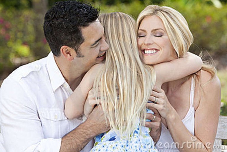 girl-child-hugging-happy-parents-park-garden-22146766.jpg
