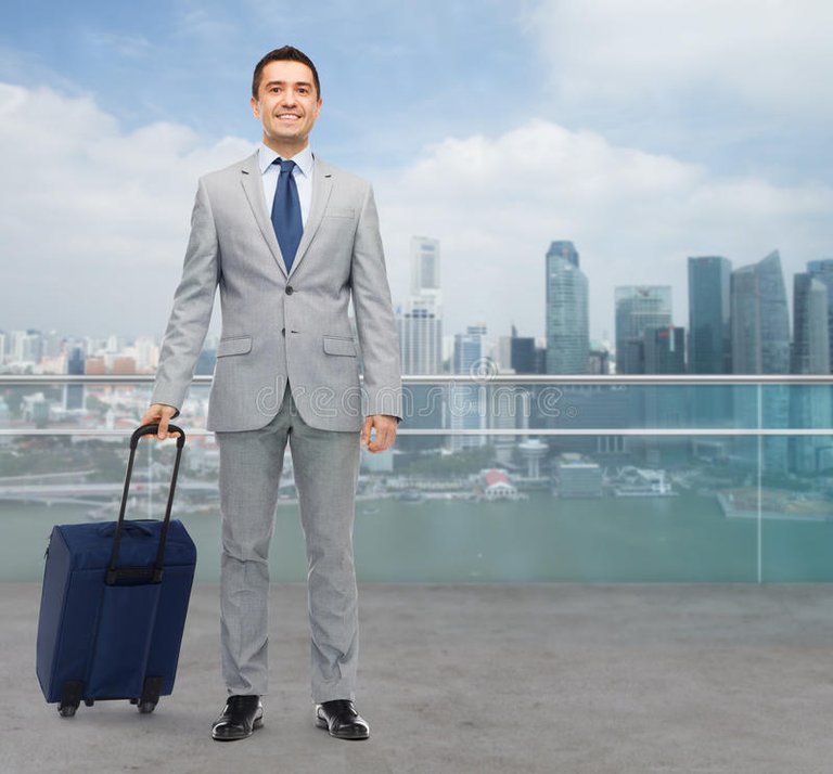 happy-businessman-suit-travel-bag-business-trip-traveling-luggage-people-concept-over-city-background-51928129.jpg