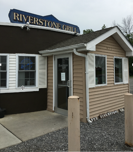 Riverstone Grill Home of the Famous Bone in the Stone Steak.png