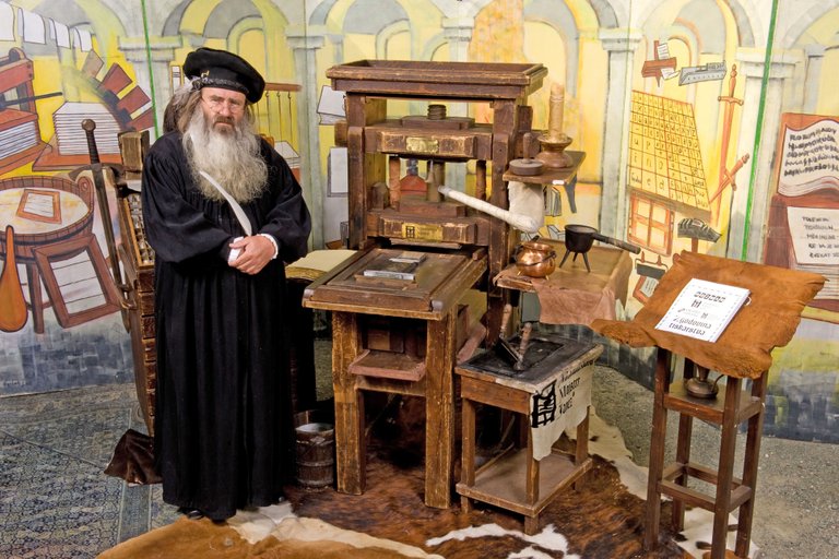 Photo by Valentin Rozman of his father with reconstruction of the Gutenberg press