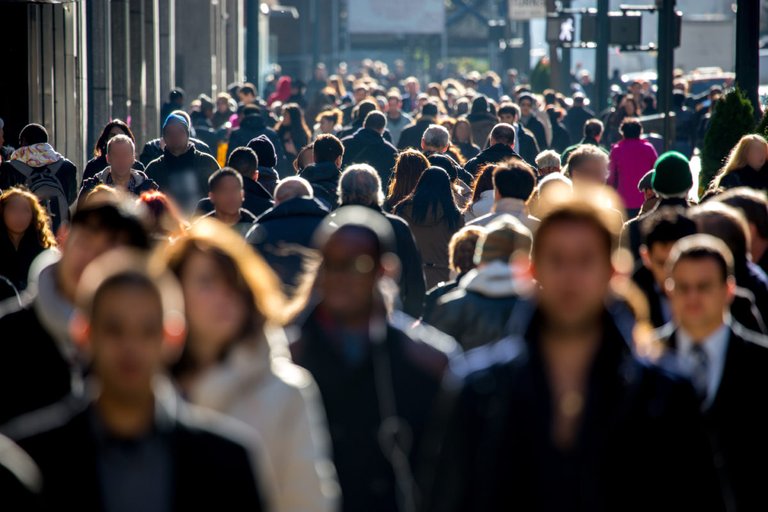 "Crossed between the two of them on the crowded sidewalks of downtown."