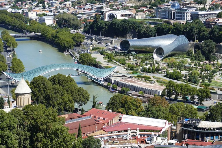 Bridge of Peace and the Rike Park to it's right in Tbilisi