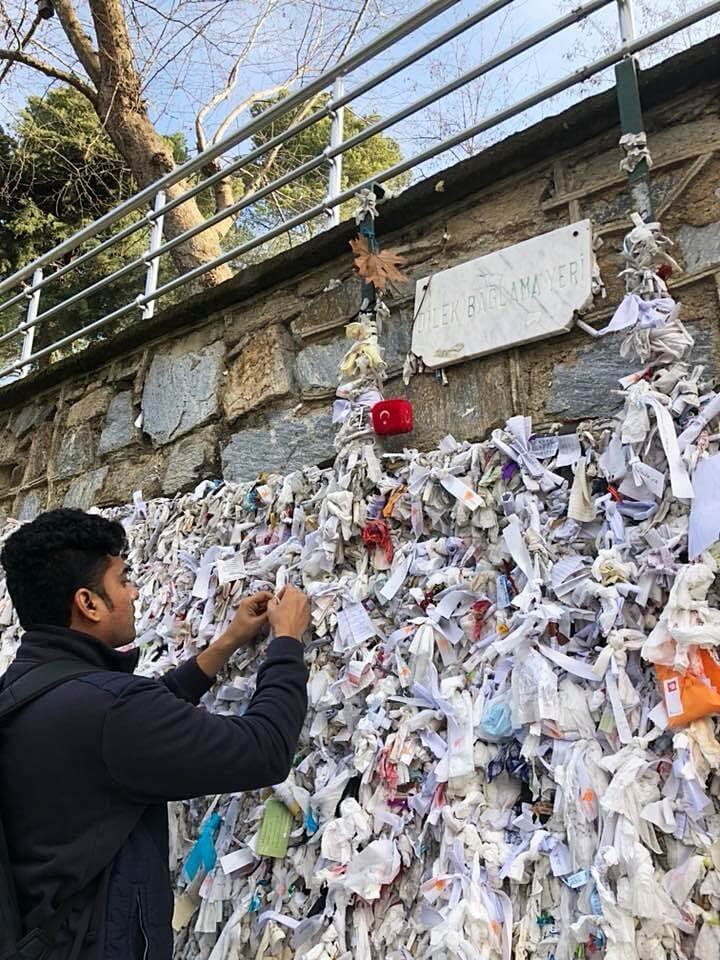 Me making a wish at the famous Wishing Wall