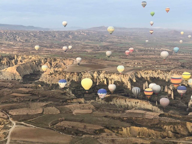 You are far away from the crowd of other balloons enjoying an exclusive view