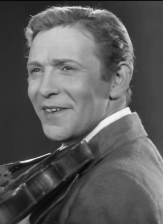 Leonid Utyosov in the film "Funny Guys" (1934). Photo Source - Wikipedia