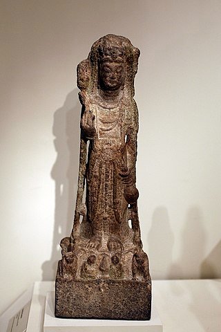 Standing Guanyin Limsetone. 580-618 C.E. Limestone. Brooklyn Museum, Gift of the Edith and Milton Lowenthal Foundation. - Brooklyn Museum , CC BY-SA 2.5, via Wikimedia Commons.