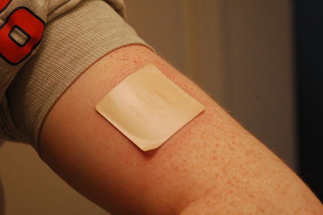 A 21 mg patch applied to the left arm. The Cochrane Collaboration finds that nicotine replacement therapy increases a quitter's chance of success by 50–60%, regardless of setting.