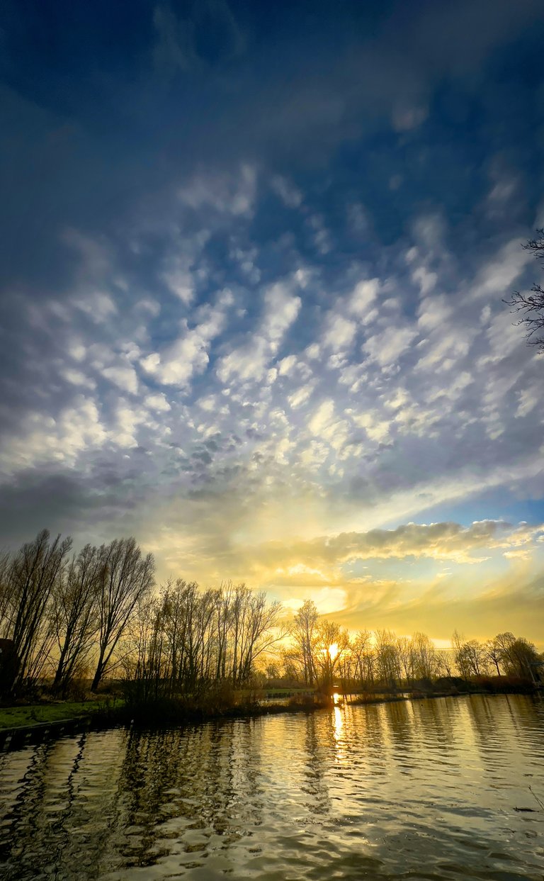 When the Clouds Break: Double Walking Luck by the Canal