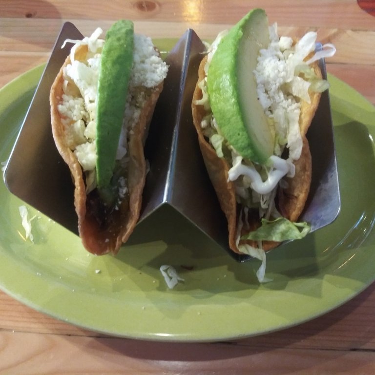 Crispy Shredded Beef Tacos topped With Cheese And Avocado At Loco Patron In Tempe, Arizona