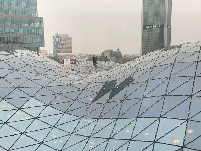 cleaning the glass roof of Złote Tarasy, mall -  Warsaw, Poland