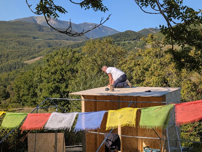 Working on the roof of the compost toilet