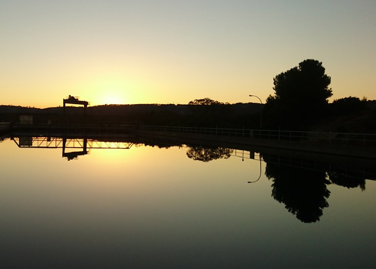 Beautiful Sunrise over Sedimentation Tank at a Water Treatment Plant