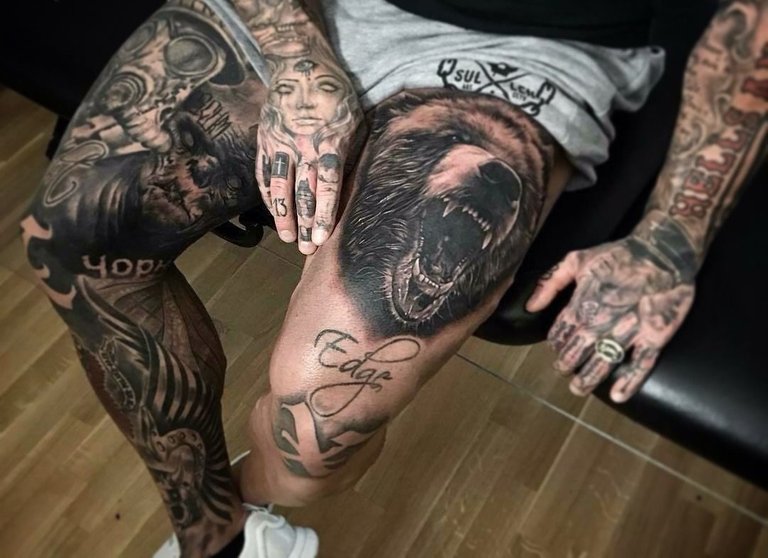  "Upper leg tattoos for men"