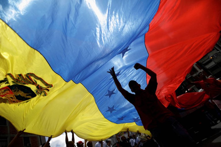 Manifestantes a favor del Gobierno de Nicolás Maduro durante una marcha contra Trump, en Caracas, el 14 de agosto de 2017. (Reuters)