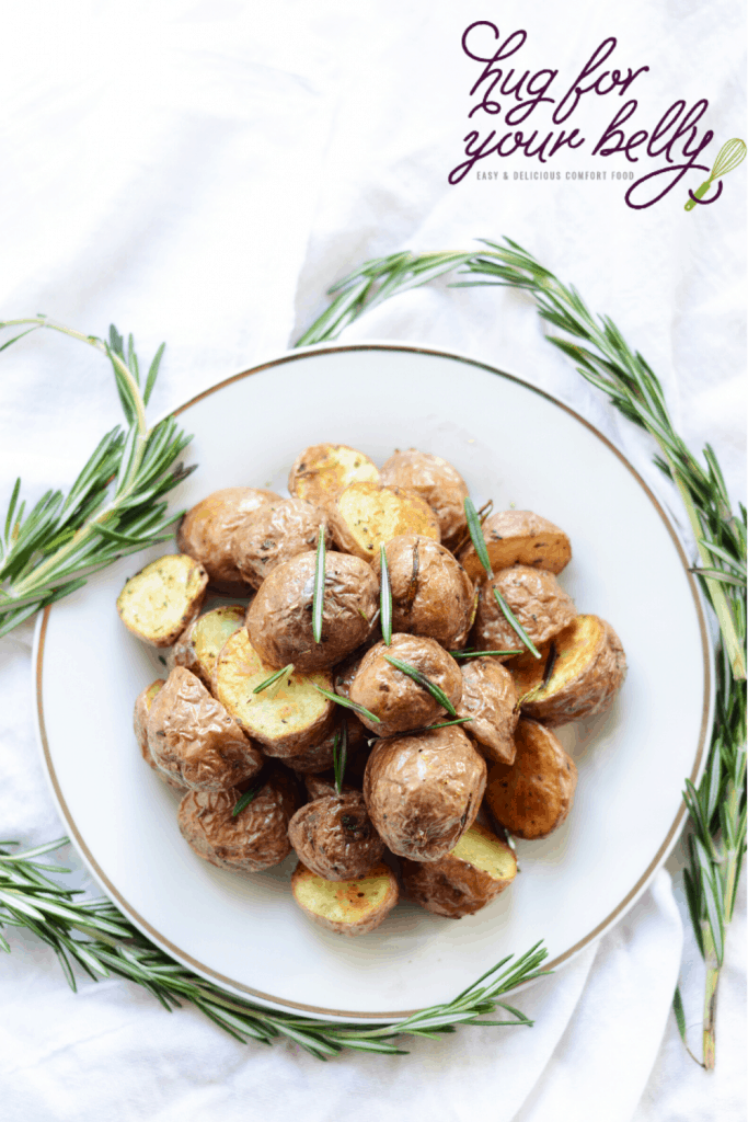 rosemary potatoes on a white plate