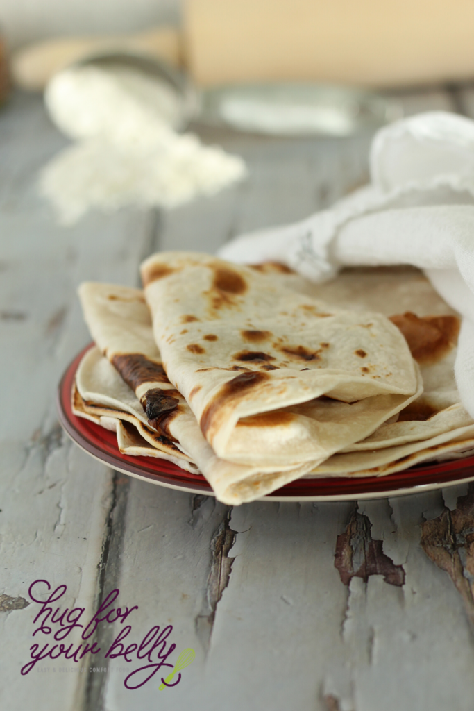 homemade tortillas on red plate