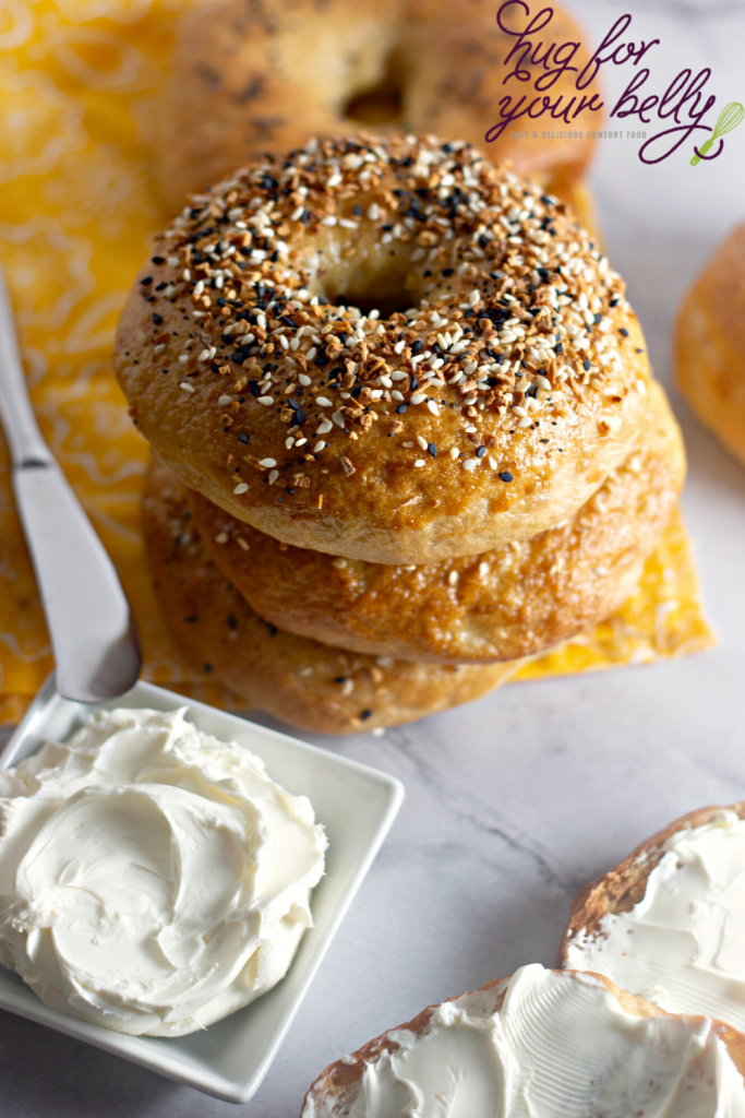 bagels stacked on yellow napkin