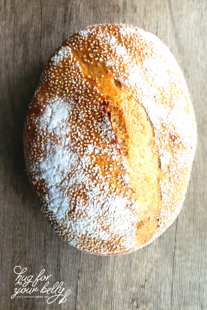 homemade sourdough bread on wooden background