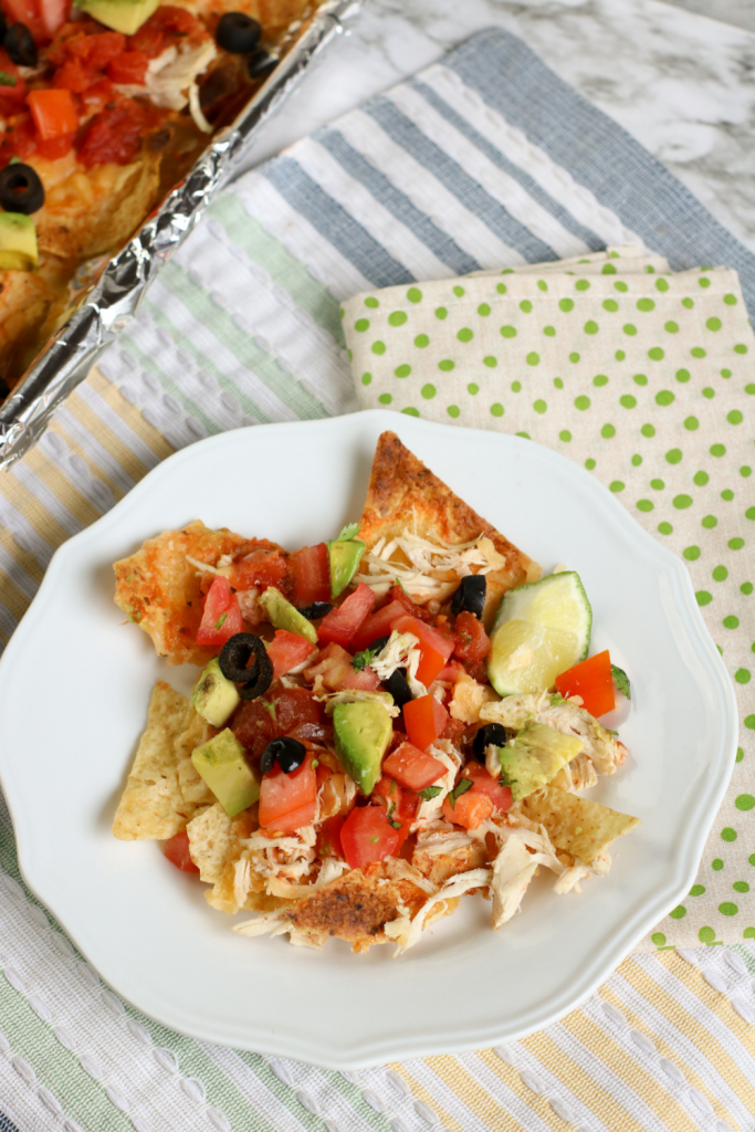 chicken nachos on white plate