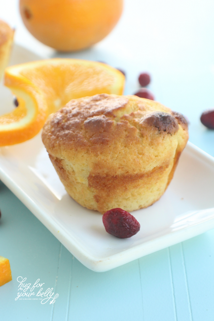 orange cranberry muffin on white plate