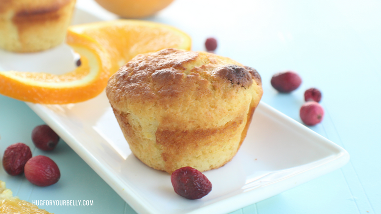 orange cranberry muffin on white plate