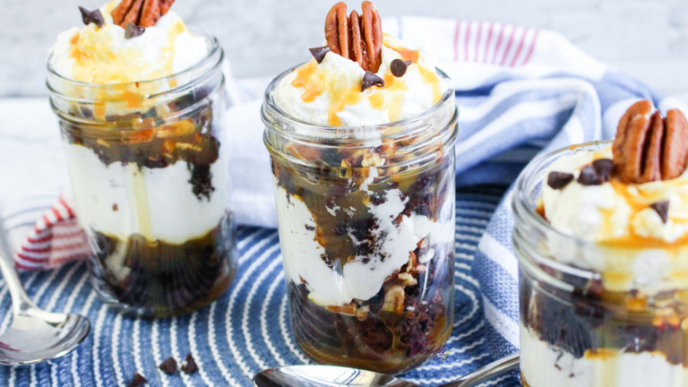 3 turtle brownie sundaes in a jar