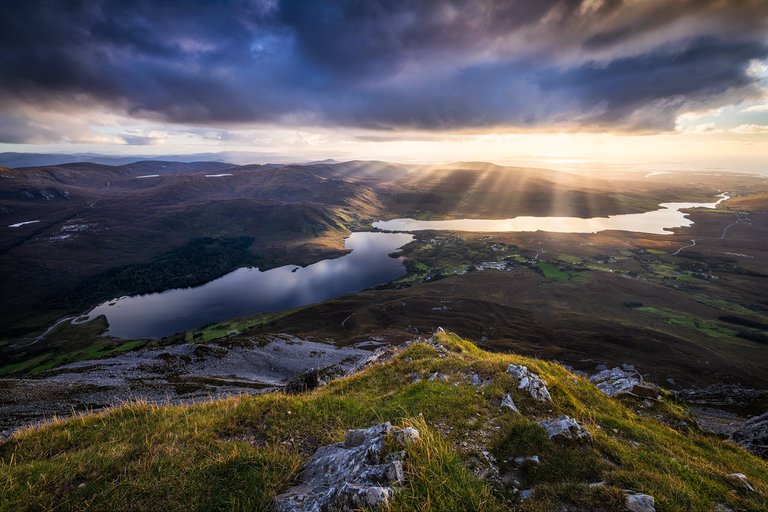 Dramatic sunset seen from the top of Mount Errigal