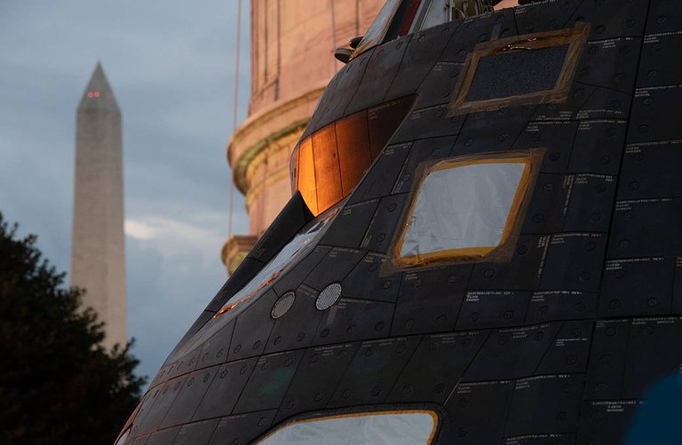NASA's Orion spacecraft that flew Exploration Flight Test-1 on Dec. 5, 2014, is seen after being uncovered in preparation for being moved onto the White House complex, Saturday, July 21, 2018, in Washington, DC.