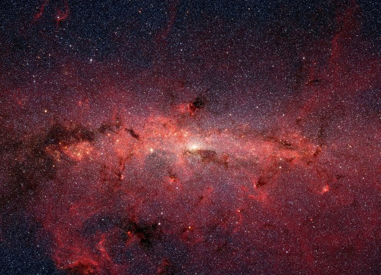 El núcleo de la Vía Láctea observado por el Telescopio Espacial Spitzer // The core of the Milky Way observed by Spitzer Space Telescope. Foto/Photo: NASA/JPL-Caltech/S. Stolovy (Spitzer Science Center/Caltech). Fuente/Source: https://www.nationalgeographic.com.es/temas/universo/fotos