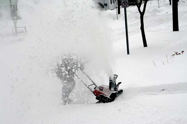 Snow Blower in the Winter Snow