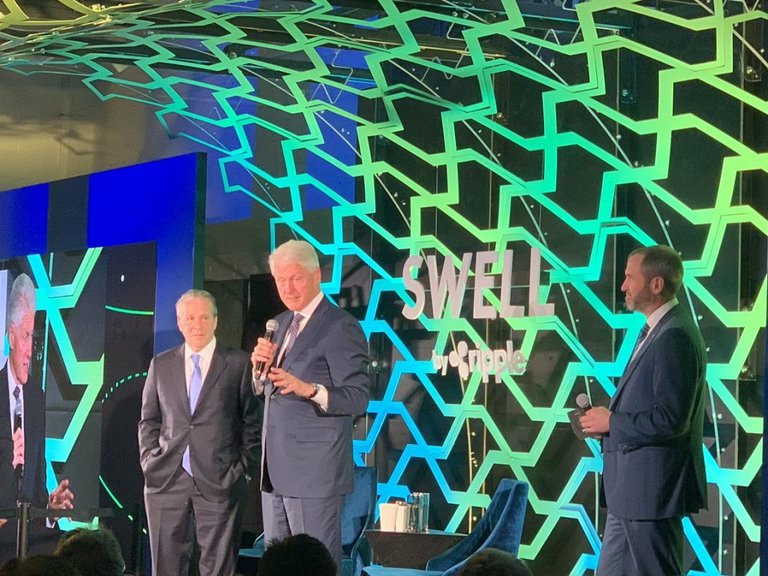 Ripple's Swell conference 2018 xRapid being used, Bill Clinton and Brad Garlinghouse on stage.