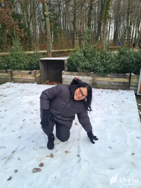 My mom getting to know the snow for the first time 