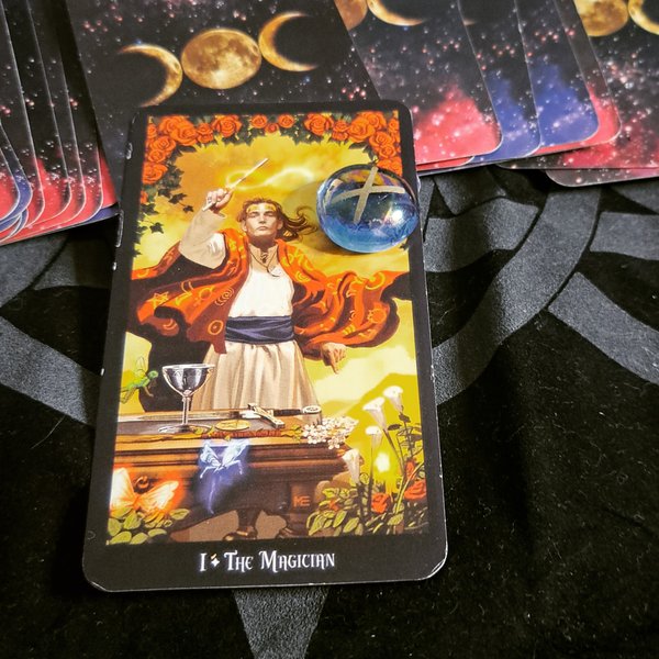 Nauthiz Paired with The Magician for Thorsday's Rune and Tarot Pull. 