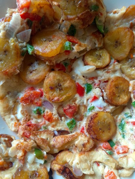 Making my first Nigerian pizza known as plantain frittata