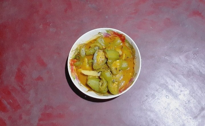 A vegan curry with pointed gourd and potato
