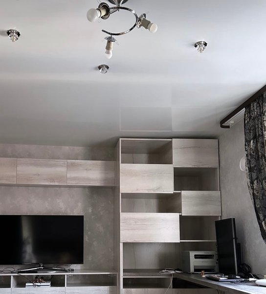 We have recently renovated, made a place for a TV, a shelving unit and put a desk almost 4 meters long