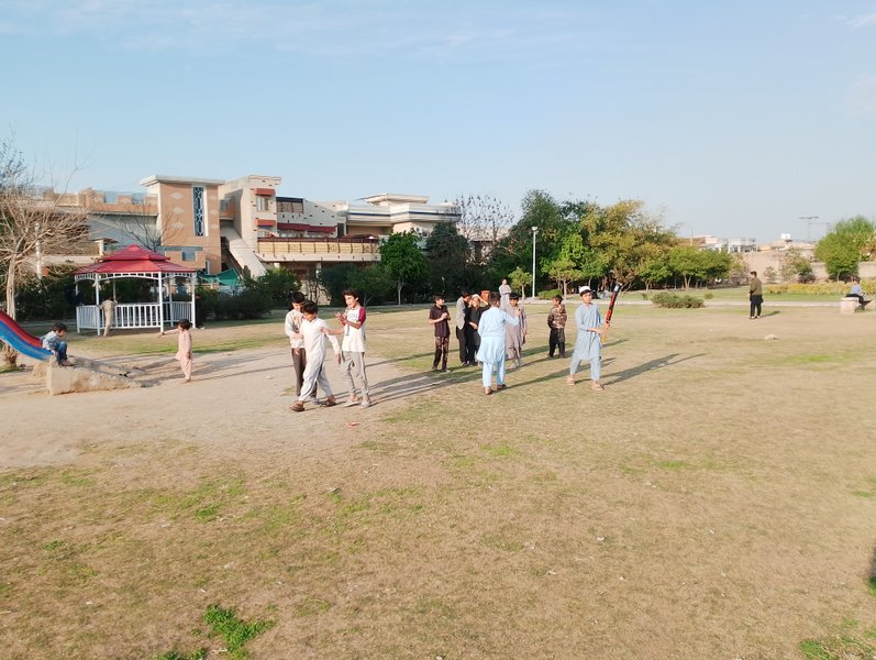 enjoying with students in the park