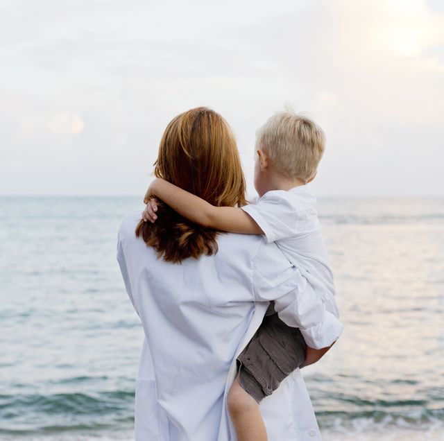 mother-and-son-admiring-ocean-royalty-free-image-592014719-1556290551.jpg